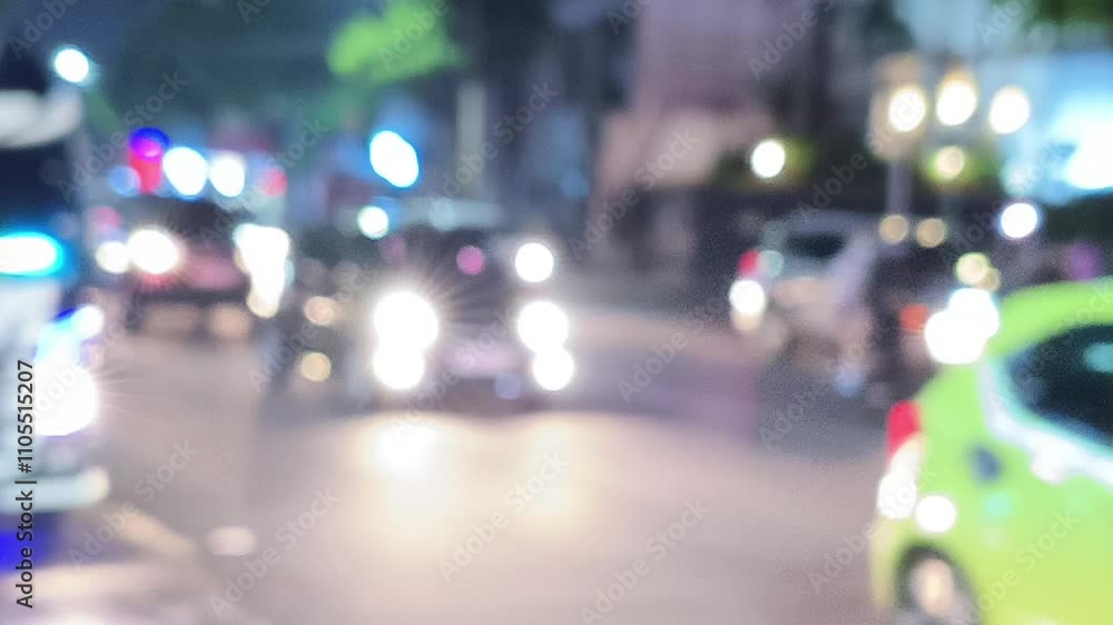 blurred, defocused, missed focus video background with the theme of a night atmosphere of passing vehicles blurred, defocused, missed focus video background with the theme of a night atmosphere of passing vehicles