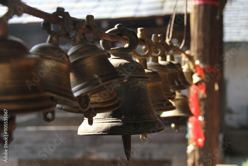 Canvastavla Rows of Brass Temple Bells Hanging Outside an Ancient Himalayan Temple in Himach