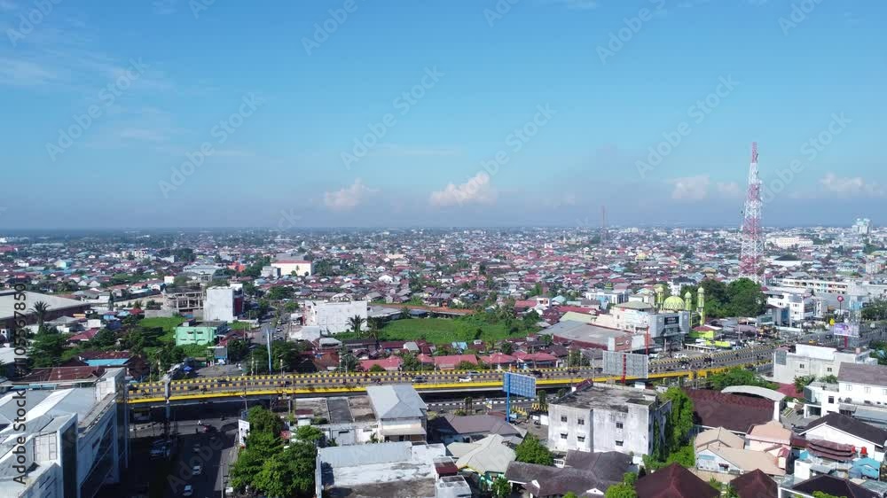 Aerial view of the dense city of Banjarmasin which is full of housing, high rise buildings Aerial view of the dense city of Banjarmasin which is full of housing, high rise buildings