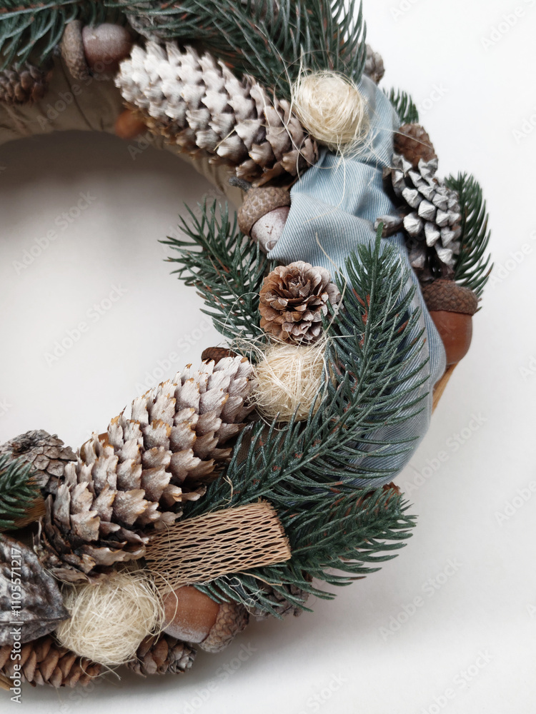 Obraz premium Christmas Wreath of pine branches, cones, leaves, beads and snowflakes. Holiday Decoration Gift For family and friends. New Year's home wall decor different angles handmade top view, side view