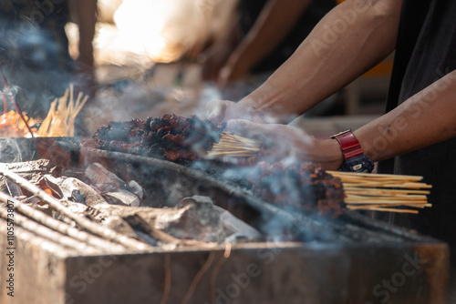Photography Man Roasting Prawns In The Center Of Singapore For Street Food