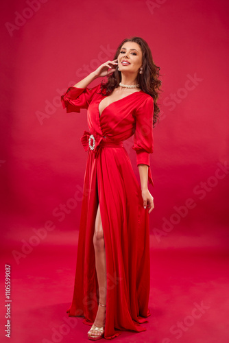 portrait of a woman in a red dress on a red background