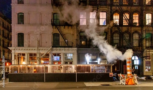 Steam emitted from the New York Steam System, dating back to 1882 providing steam to heat, cool or disinfect around 1,700 buildings, New York, United States of America, North America photo