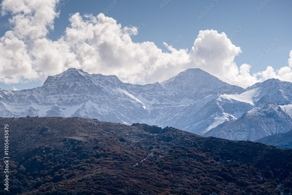 Panoramic view of the snowy Sierra Nevada with Alcazaba, Mulhacen and Pico de Veleta, viewed from Guejar Sierra, Sierra Nevada, Andalusia, Spain Panoramic view of the snowy Sierra Nevada with Alcazaba, Mulhacen and Pico de Veleta, viewed from Guejar Sierra, Sierra Nevada, Andalusia, Spain
