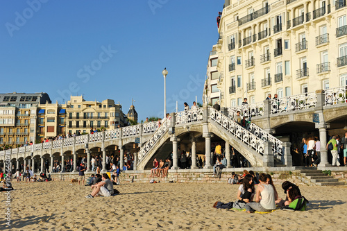 Night market under arcade of Paseo de La Concha, La Concha beach, San Sebastian, Bay of Biscay, province of Gipuzkoa, Basque Country, Spain photo