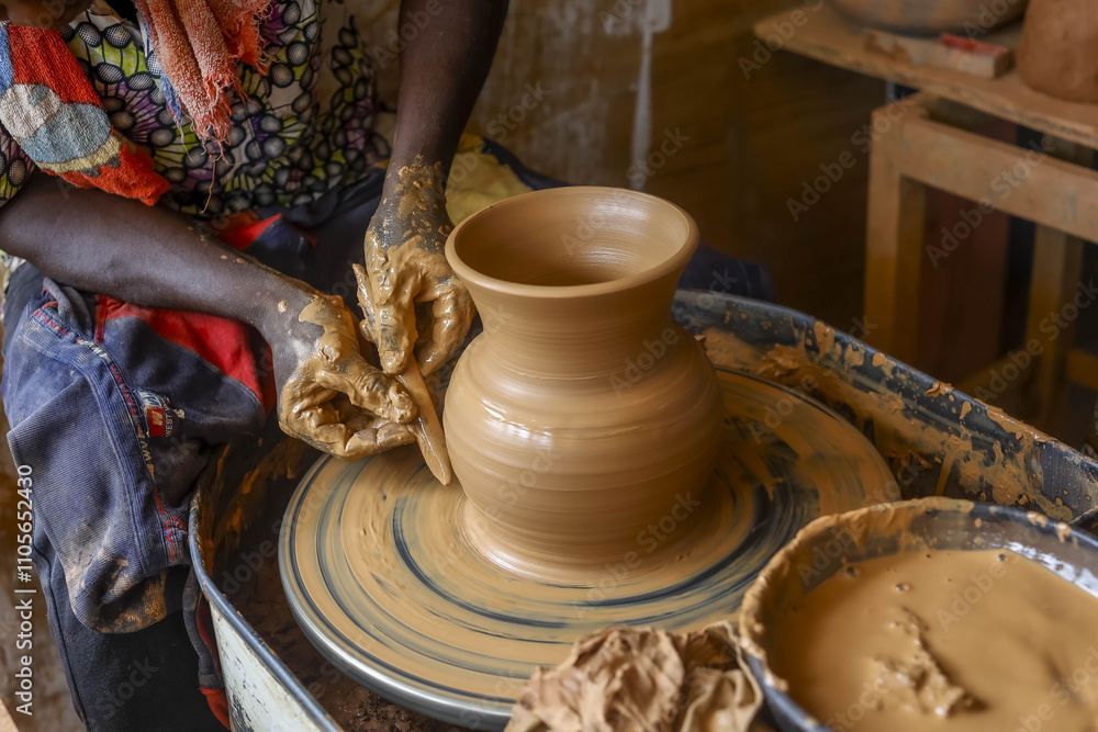 Potter at work in Kpalime, Togo, West Africa