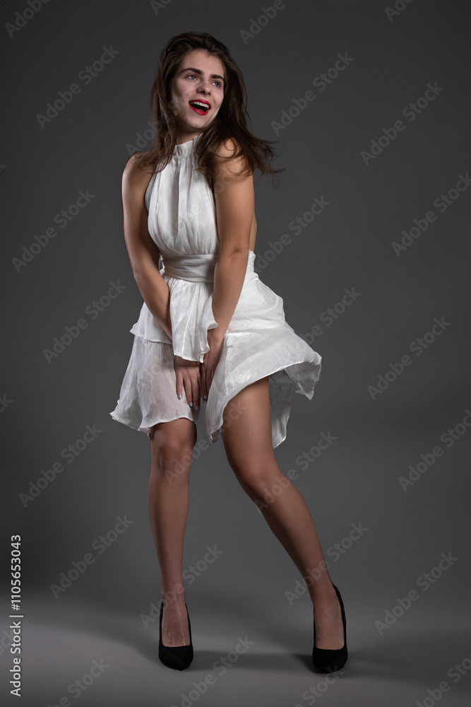 Studio photo session of a girl with white dress Studio photo session of a girl with white dress