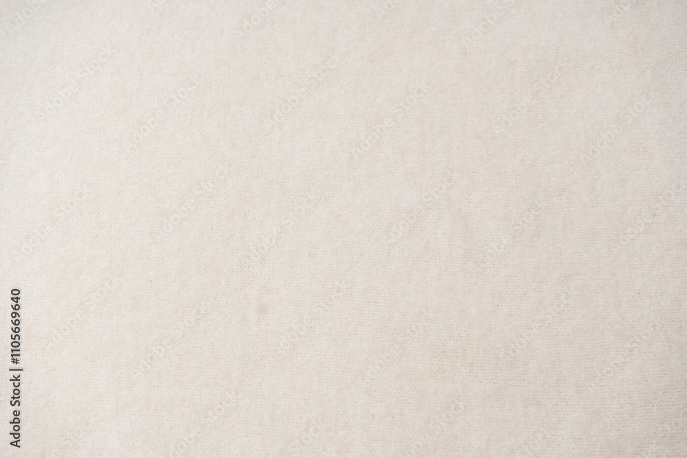 Beige sweater texture as a background. Beige sweater texture as a background.