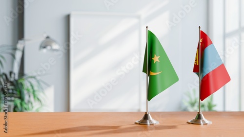 FLAGS OF MAURITANIA AND MONGOLIA ON TABLE photo