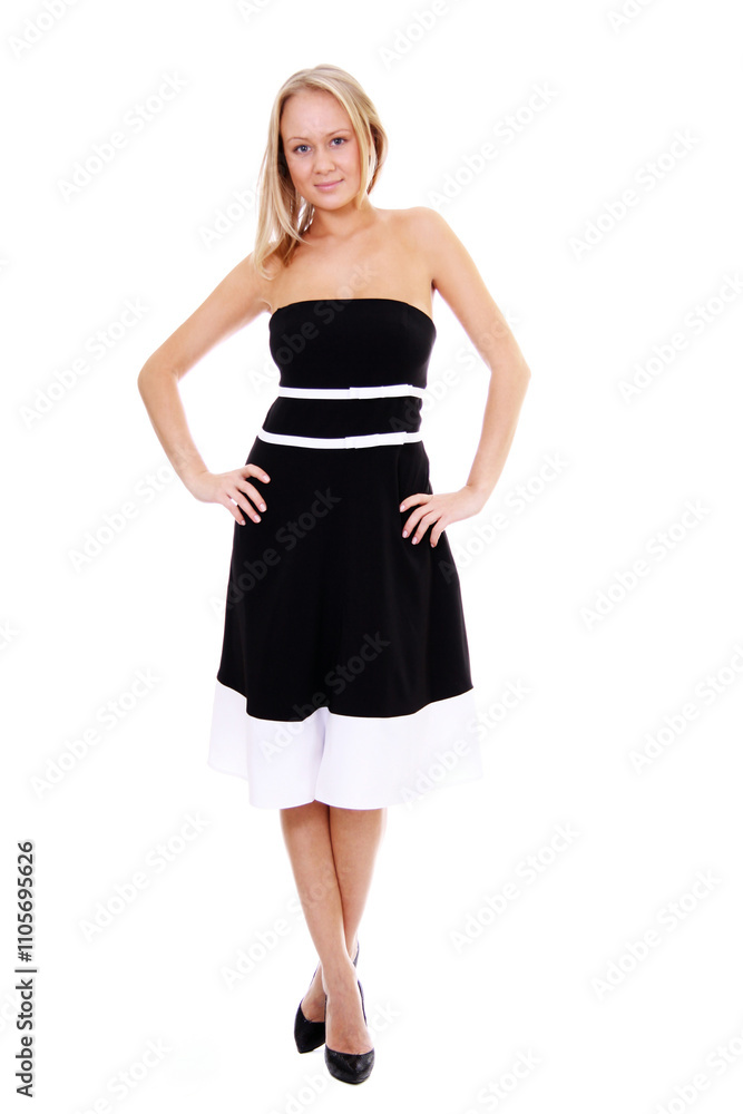Naklejka premium Portrait of a young beautiful blonde girl in a black dress