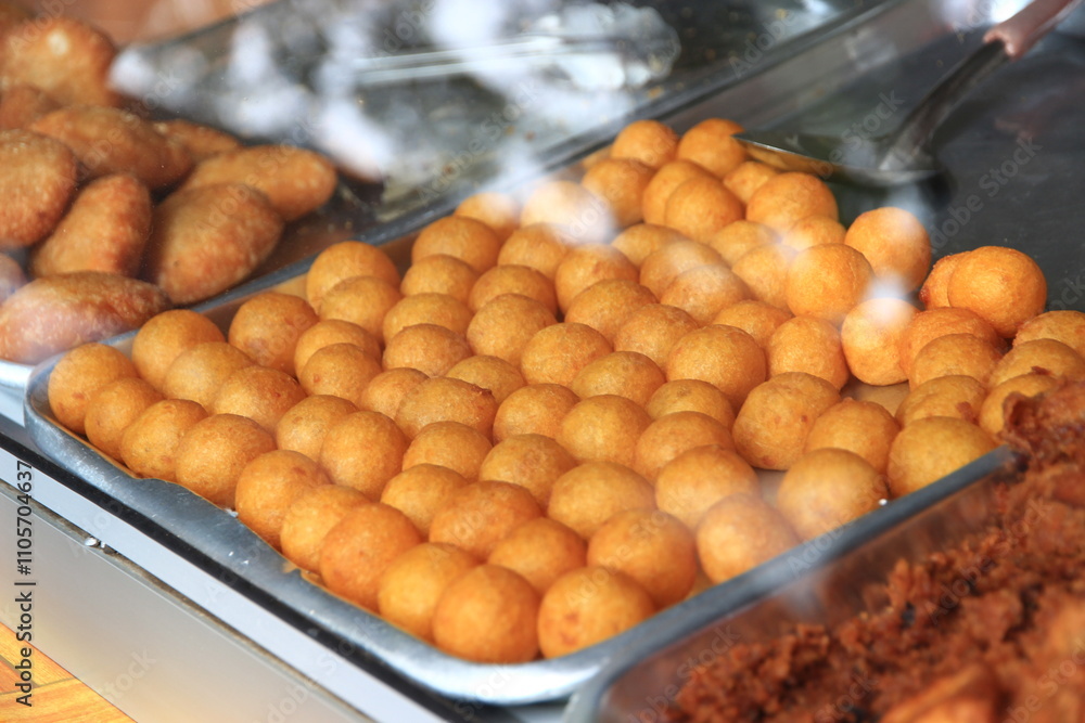 Crispy fried dough, a popular and delicious Thai dessert. Crispy fried dough, a popular and delicious Thai dessert.