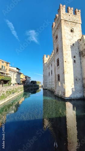 Sirmione, Italy - November 6, 2024: Scaliger Castle, the historic center of Sirmione, on the shores of Lake Garda.