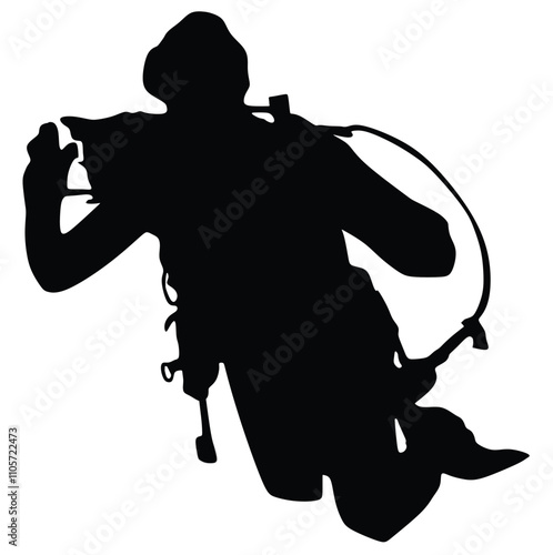 silhouette of a diver under full scuba gear