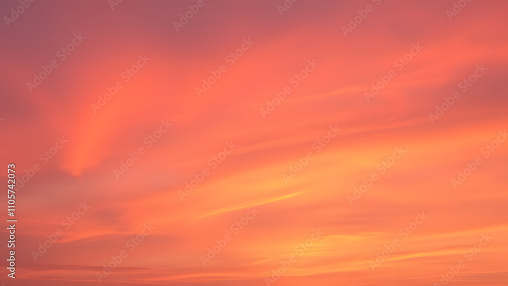 A dreamy sunset sky with hues of orange, pink, and purple blending into each other sea A dreamy sunset sky with hues of orange, pink, and purple blending into each other sea