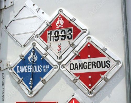 Hazmat placards on trailer door.  Scanned from film
source. Denoised,. Cropped. Resubmission.