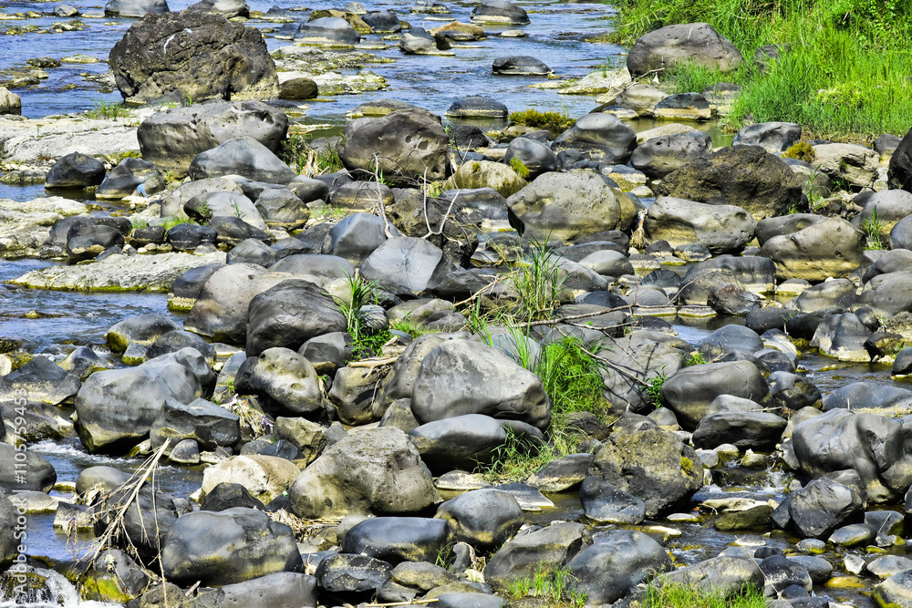Beautiful, aesthetic and artistic river rocks with clear water in rural Asia Indonesia Beautiful, aesthetic and artistic river rocks with clear water in rural Asia Indonesia