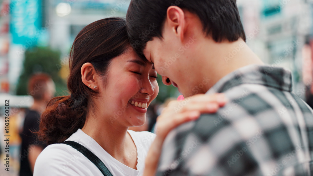 Love, happy couple and forehead touch outdoor for support, loyalty and commitment on vacation. Japanese man, woman and embrace for romantic relationship, connection and trust partner on date in city Love, happy couple and forehead touch outdoor for support, loyalty and commitment on vacation. Japanese man, woman and embrace for romantic relationship, connection and trust partner on date in city