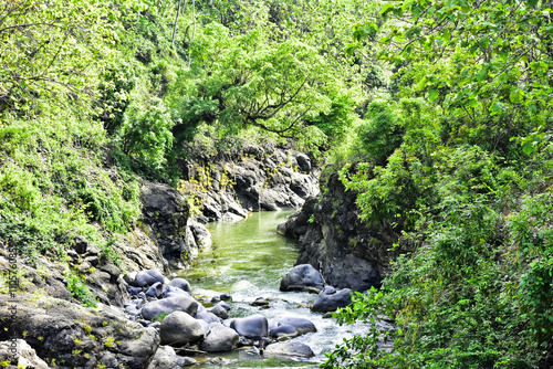 Beautiful, aesthetic and artistic river rocks with clear water in rural Asia Indonesia	