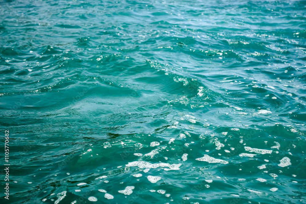 An abstract background of seawater flow under light exposure An abstract background of seawater flow under light exposure