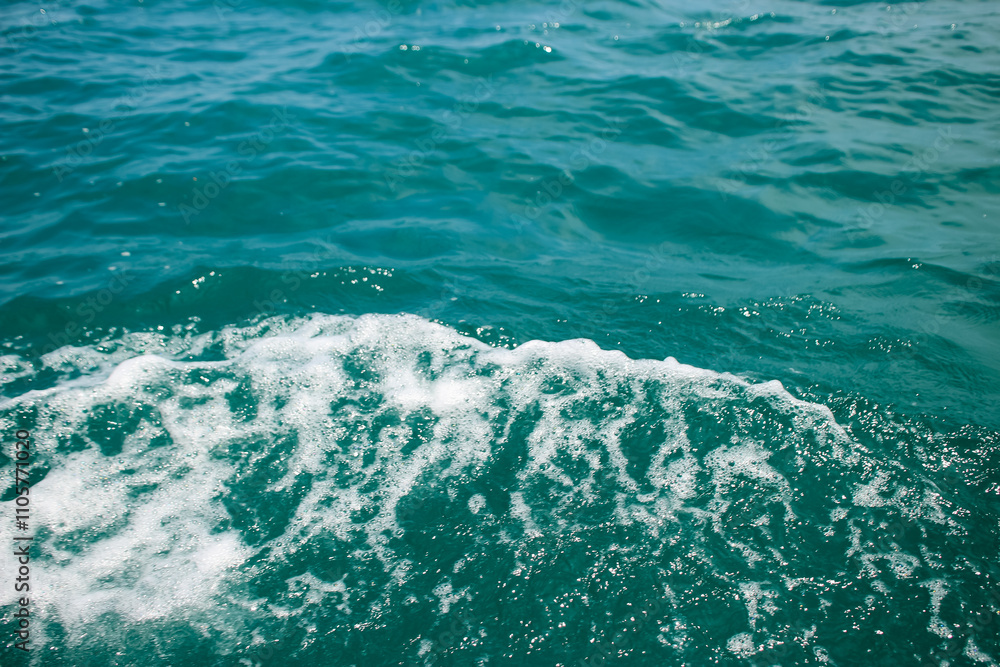 Fototapeta premium An abstract background of seawater flow under light exposure