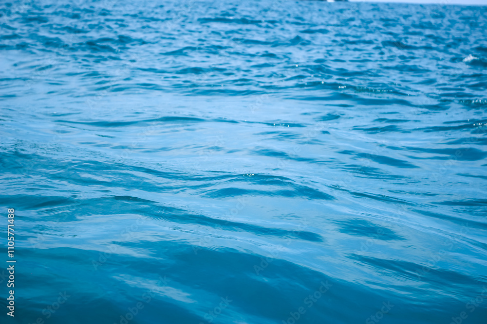 An abstract background of seawater flow under light exposure An abstract background of seawater flow under light exposure