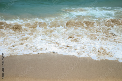 Wallpaper Mural Soft waves of blue sea with foam on golden white sandy beach. Wave background Torontodigital.ca