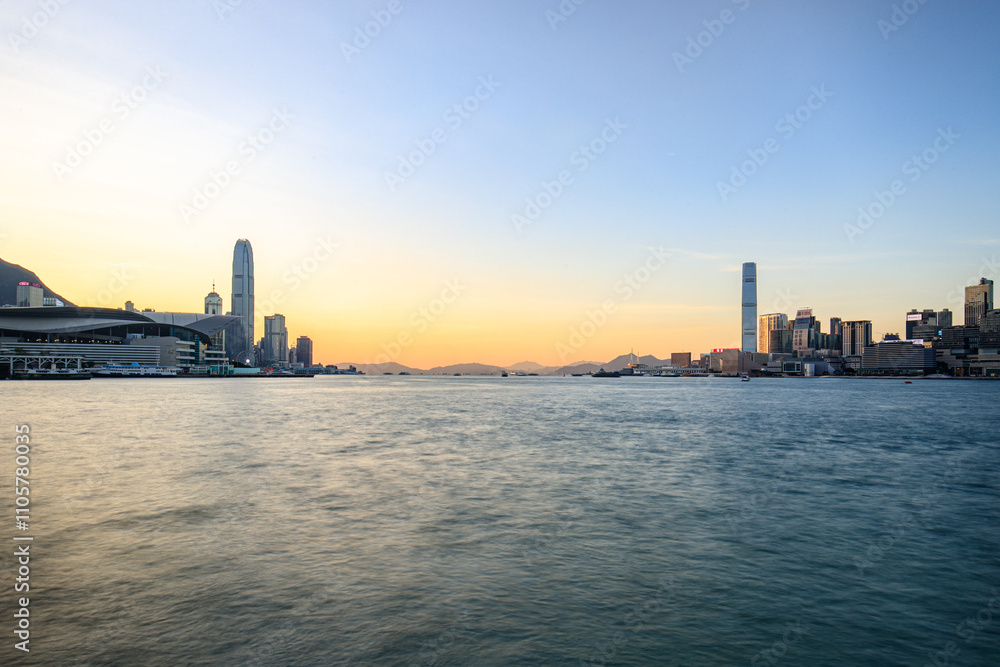 Serene Twilight Over Victoria Harbour with Hong Kong Skyline Serene Twilight Over Victoria Harbour with Hong Kong Skyline