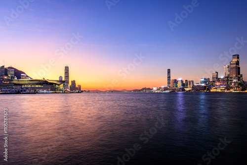 Photography Vibrant Sunset Over Hong Kong's Iconic Skyline and Victoria Harbour