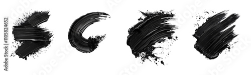 Diverse black paint strokes showcasing artistic expression and texture. photo