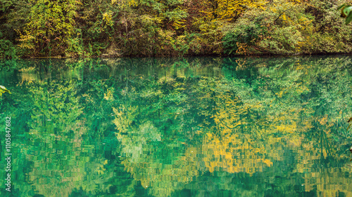 Tableau sur toile adda river during the autumnal season, lecco