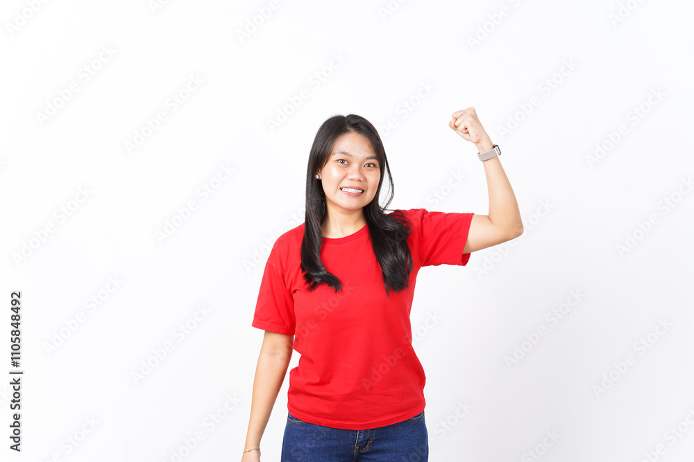 Showing strength and rise arms Of Beautiful Asian Woman wearing red shirt Isolated On White Background Showing strength and rise arms Of Beautiful Asian Woman wearing red shirt Isolated On White Background