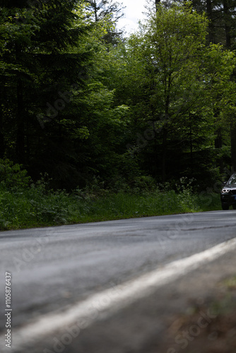 car approaching on a country road in Bergisches Land Germany
