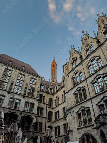 Beautiful aerial footage of Marienplatz the magestic New Town Hall, its clock and the Frauenkirche gothic church in the City of Munich Babaria Germany photo