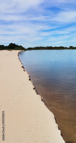 Playa al costado de río photo