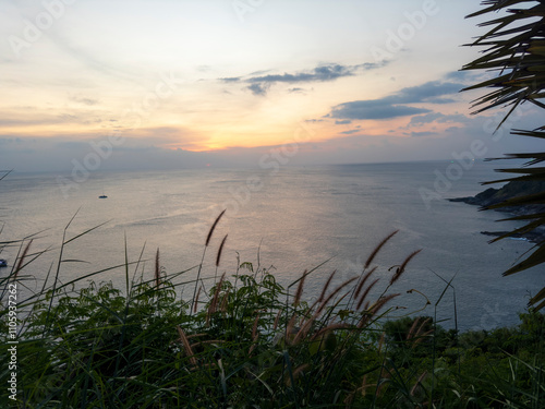 Promthep cape viewpoint at sunset in Phuket, Thailand. photo