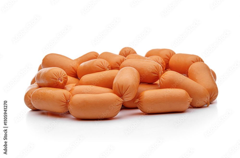 Small appetizing sausages on a white background.