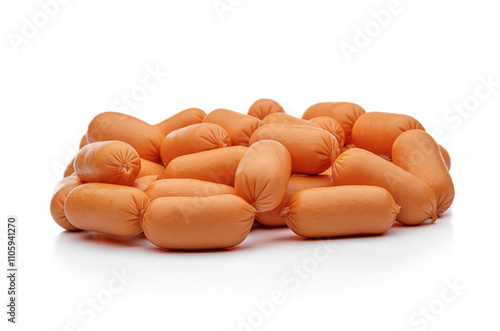 Obraz na płótnie Small appetizing sausages on a white background. w salonie