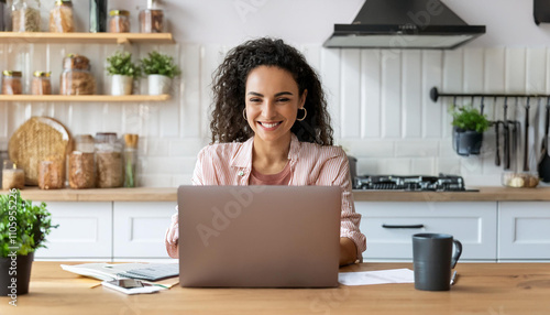 Young businesswoman manage business from home on remote, freelancer using laptop sit kitchen table on self-quarantine, work over personal growth, apply for online courses to learn new skills.