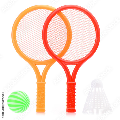 Badminton set made of plastic for children, isolated on a white background. Toy rockets, a shuttlecock ball for playing tennis. Children's sports. Development of a child's sports skills