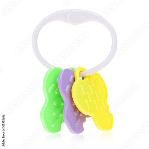 Plastic colored baby rattle isolated on a white background. A bright rattle for a child. Toys for concentration of attention