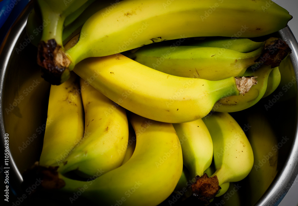 Concept photos of fresh bananas on kitchen table Concept photos of fresh bananas on kitchen table