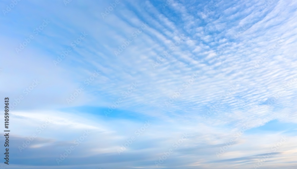 Floating white clouds in a vast sky, serene and magnificent. Floating white clouds in a vast sky, serene and magnificent.