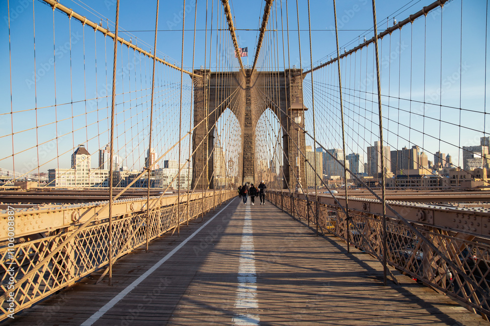 Fototapeta premium The Brooklyn Bridge during winter with a blue sky