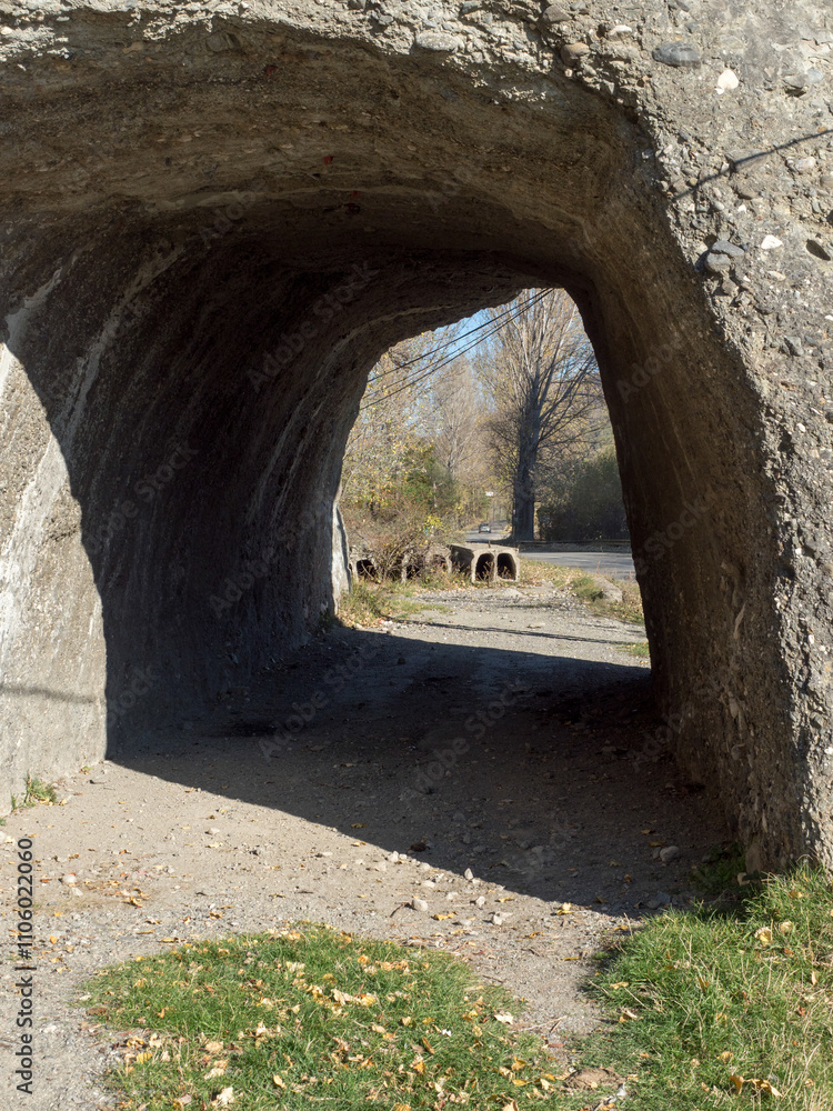A natural tunnel on the road through Doftana river valley, Prahova county, Romania. A natural tunnel on the road through Doftana river valley, Prahova county, Romania.