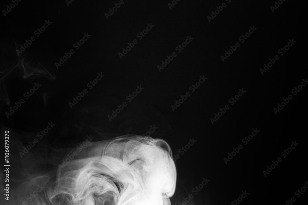 Abstract Smoke Swirls on Black Background Abstract Smoke Swirls on Black Background
