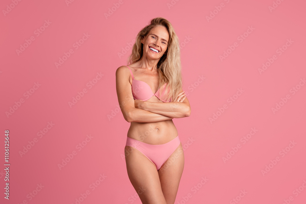 Obraz premium Photo of positive charming woman crossed arms wear stylish underwear isolated on pink color background