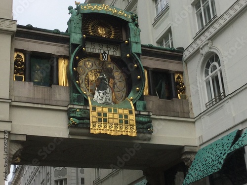 Historic clock tower bridge in a European city photo