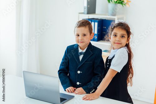 Fotografija Boy With Girl School children With Laptop At School
