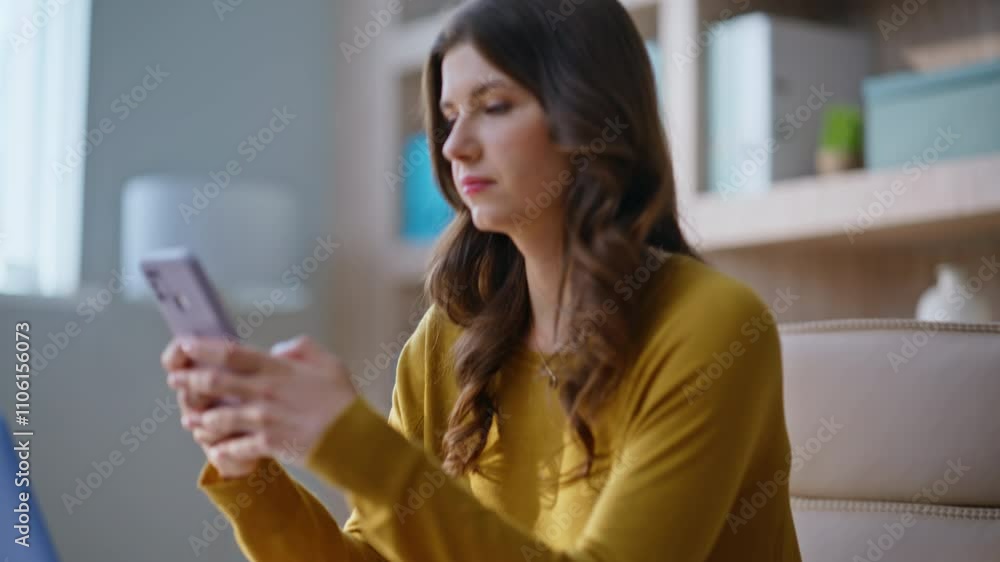 Busy employee receiving sms at cellphone sitting modern workplace closeup. Busy employee receiving sms at cellphone sitting modern workplace closeup.
