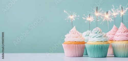 Colorful cupcakes with sparklers celebrating a festive occasion